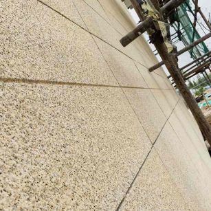 哈尔滨 黄金麻花岗岩荔枝面外墙干挂石材效果示例