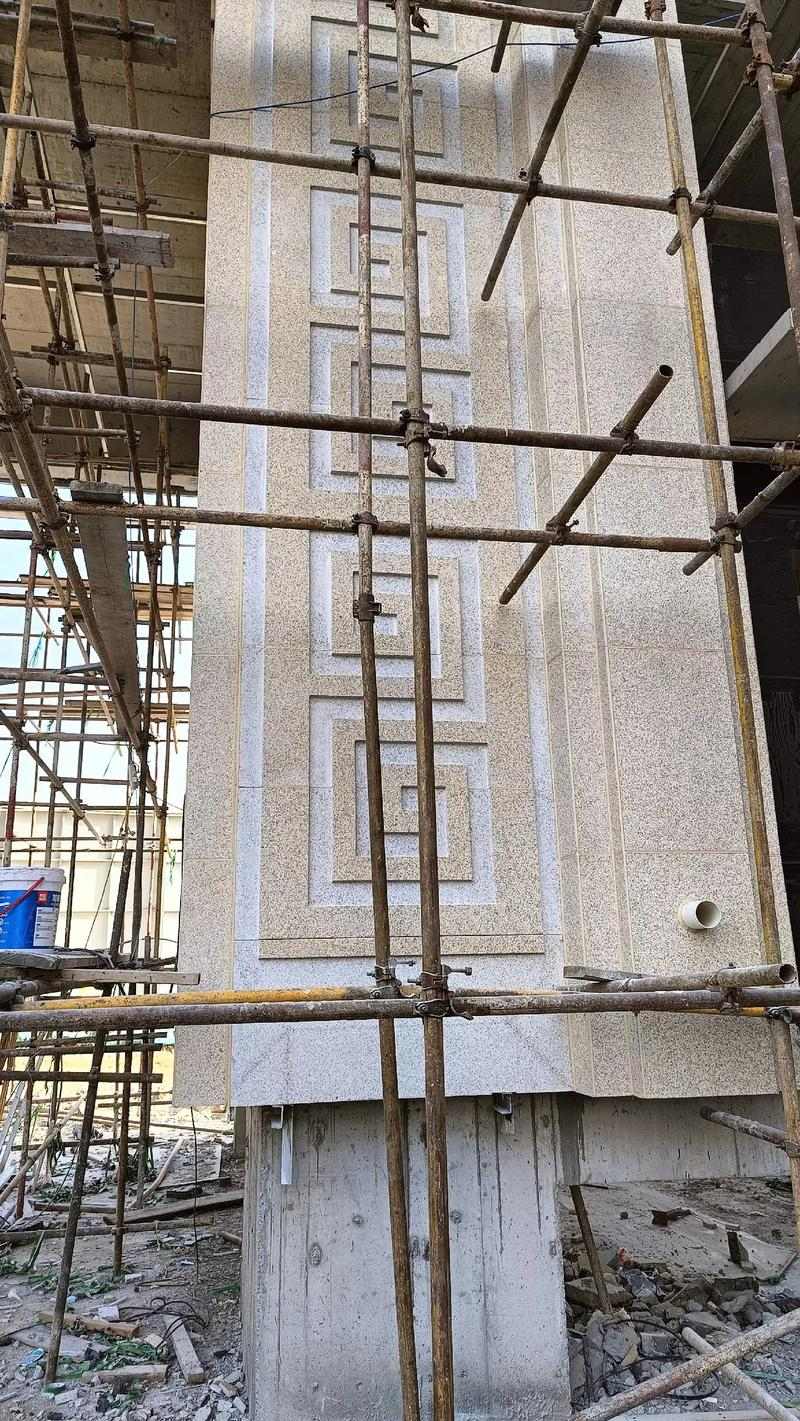 哈尔滨 黄金麻花岗岩别墅外墙干挂回纹造型效果