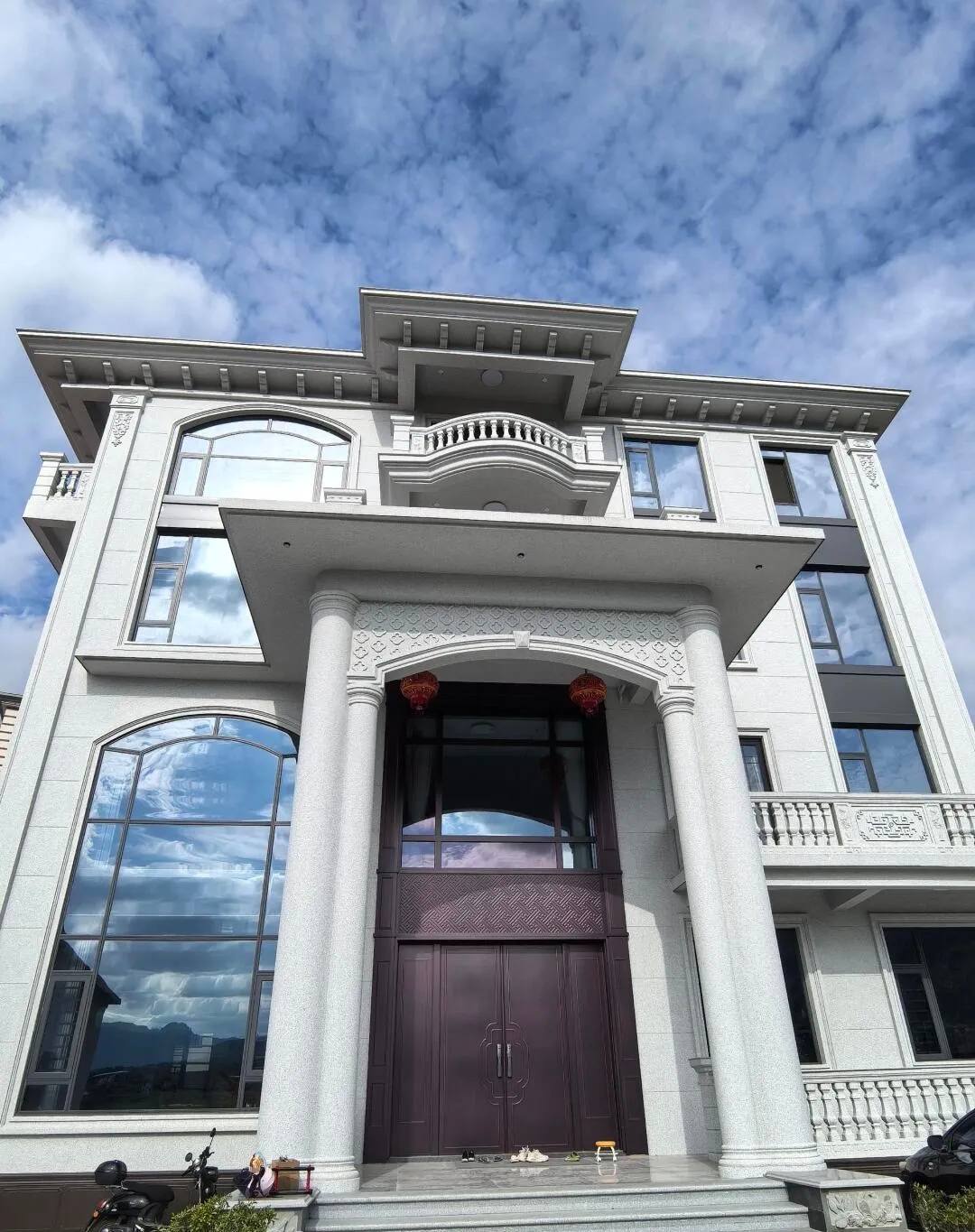 哈尔滨白麻别墅外墙干挂石材效果示例