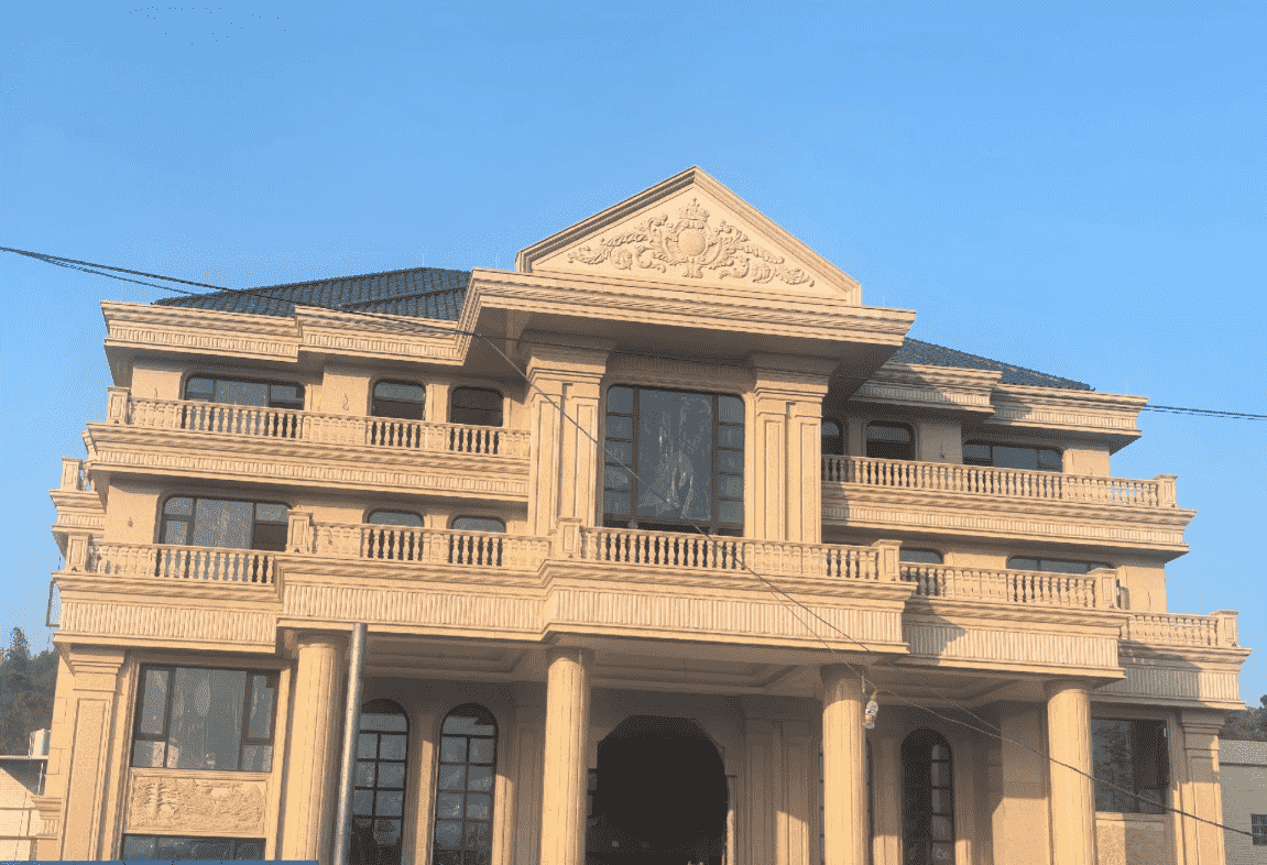 哈尔滨黄金麻别墅外墙干挂石材效果示例